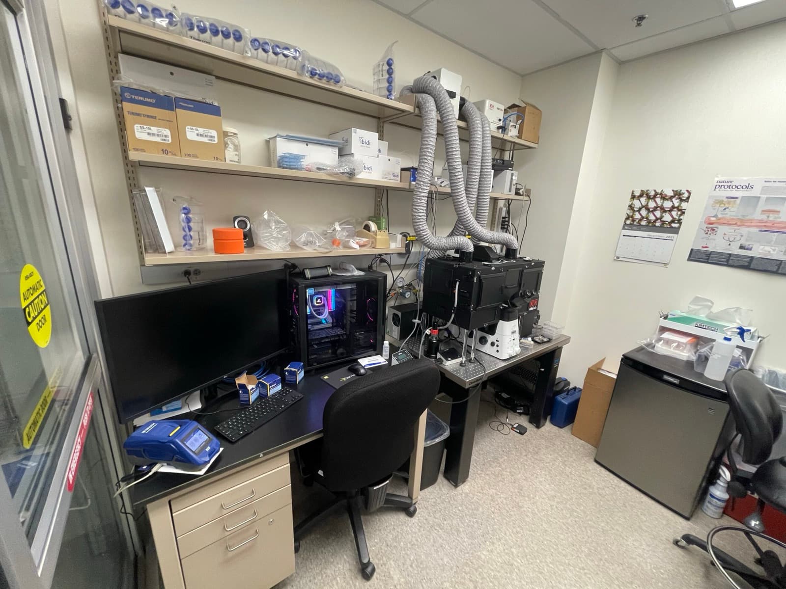 A spinning disk confocal microscope with its controller stack